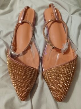 Cape Robbin pointed-toe slingback flats feature straps and a gold rhinestones
